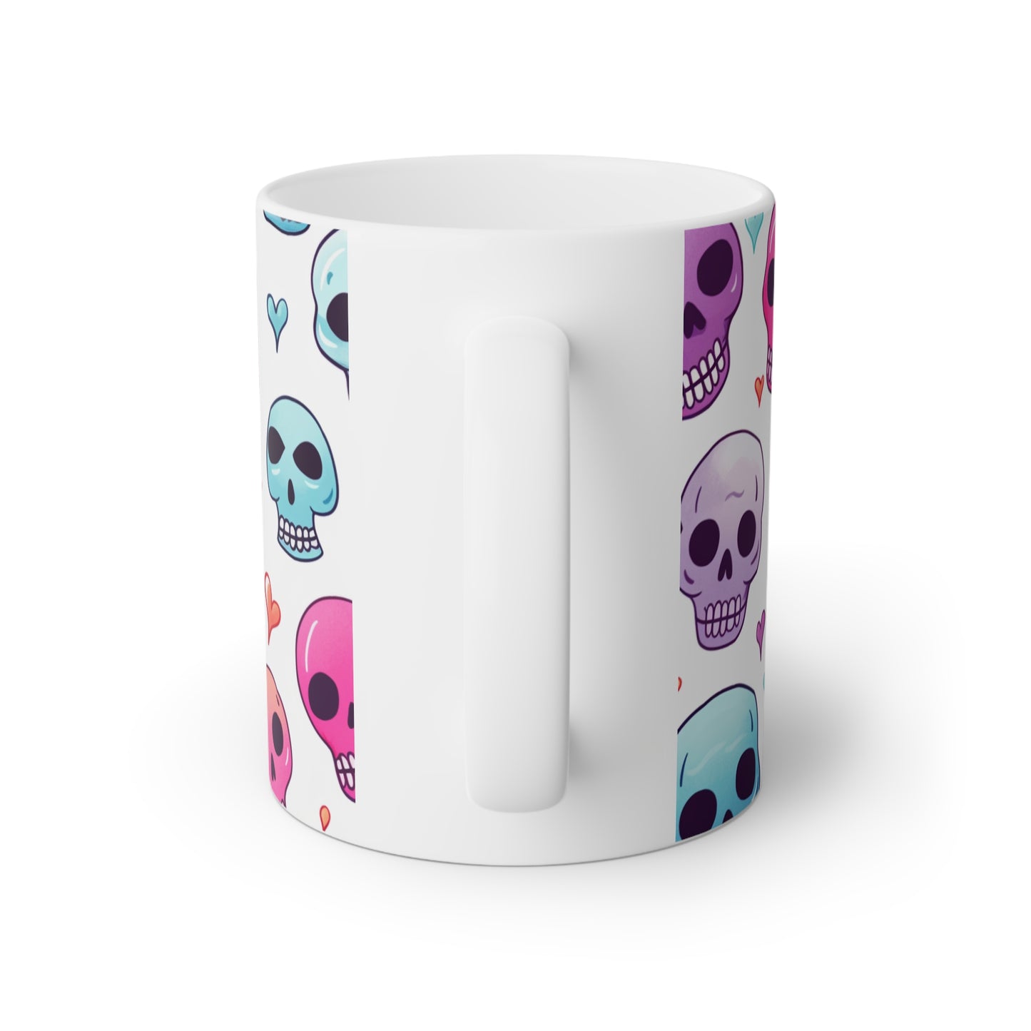 Close up image of a white ceramic mug with colorful cartoon skulls, back side view