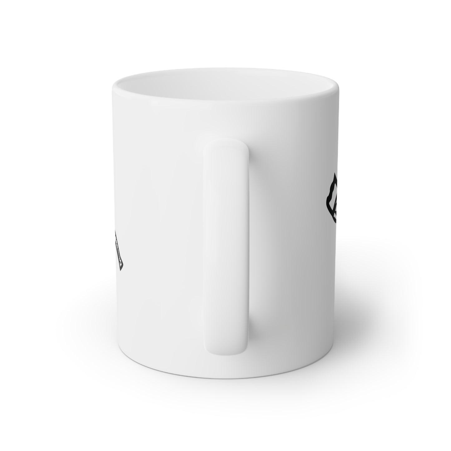 Close up image of a white ceramic mug with a black and white hammer and wood saw, back side view